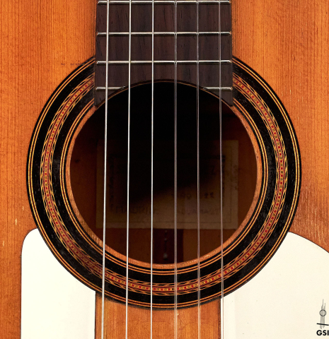 The rosette of a 1922 Santos Hernandez flamenco guitar with pegs made of spruce and cypress.