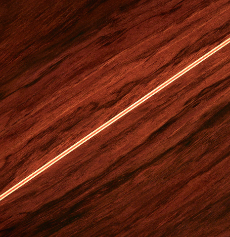 The back of a 2000 Conde Hermanos "AF 25/R" flamenco guitar made with spruce and CSA rosewood.
