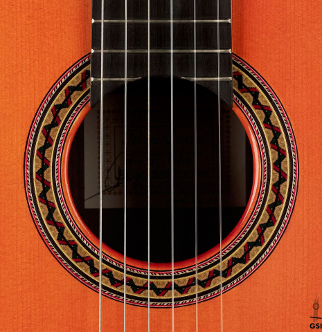 The rosette of a 2011 Felipe Conde "FC 27" flamenco guitar made with spruce and Indian rosewood