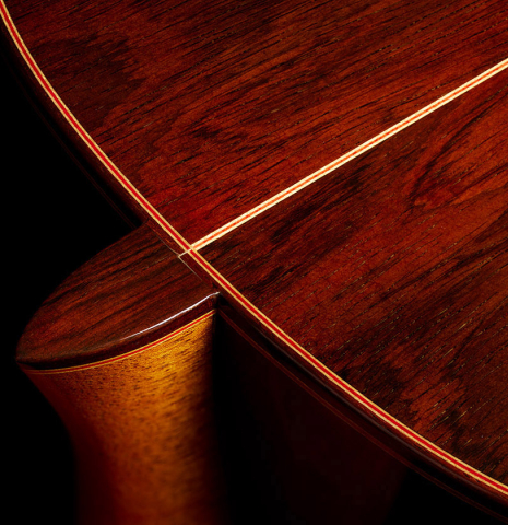The heel, back binding and purflings of a 2008 Conde Hermanos "AF 25/R" flamenco guitar made with spruce and CSA rosewood.