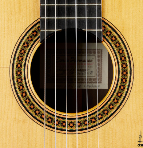 The rosette of a 2008 Conde Hermanos "AF 25/R" flamenco guitar made with spruce and CSA rosewood.