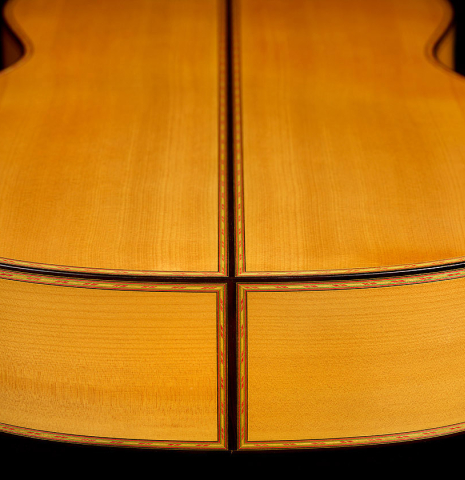 The back and sides at the foot of a 2006 Conde Hermanos "Felipe V" flamenco guitar made of spruce and cypress