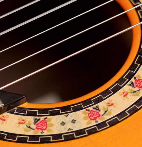 A close-up of the rosette of a 2010 Felipe Conde &quot;FC 27&quot; flamenco guitar made with spruce and Indian rosewood