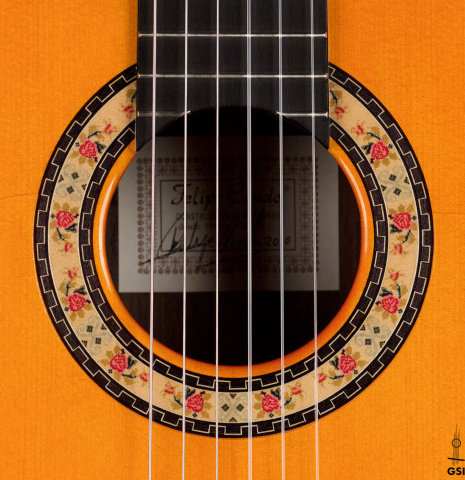 The rosette of a 2010 Felipe Conde &quot;FC 27&quot; flamenco guitar made with spruce and Indian rosewood