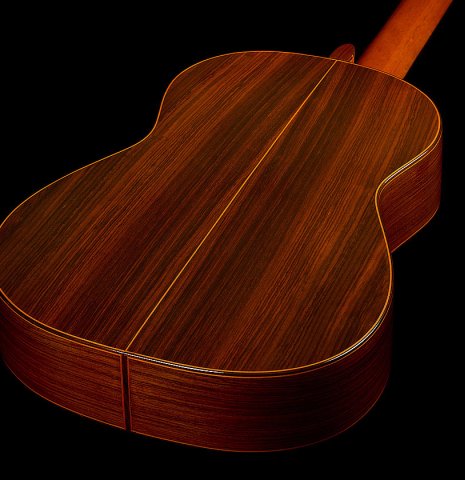 The back and sides of a 1987 Conde Hermanos "Negra" flamenco guitar made of spruce and Indian rosewood