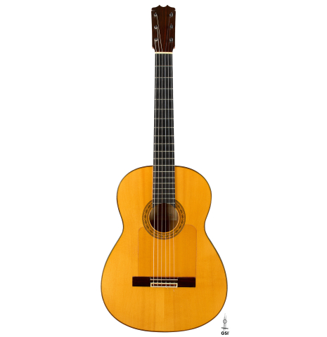 The front of a 1992 Conde Hermanos w/pegs flamenco guitar made of spruce and cypress