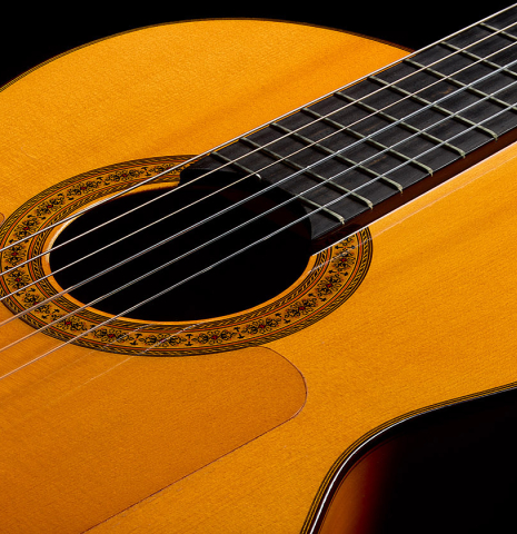 The top and tap plate of a 1992 Conde Hermanos w/pegs flamenco guitar made of spruce and cypress