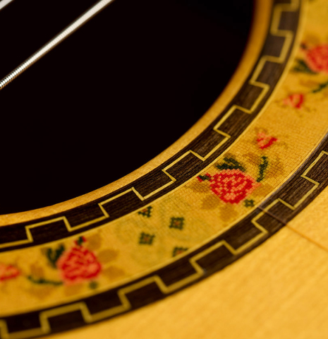 Closeup of the rosette detail of a 1999 Conde Hermanos "Concert Blanca" made of spruce and cypress
