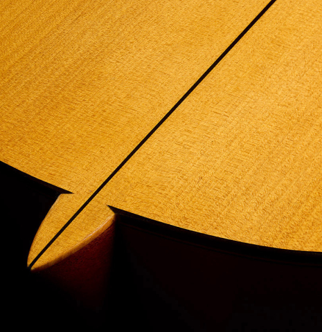 The heel, back binding and purfling of a 2017 Stephen Hill "2a Blanca" flamenco guitar made of spruce and cypress