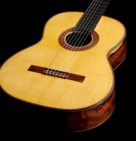 The top and sides of a 2024 Wolfgang Jellinghaus "Flamenca Negra" flamenco guitar with spruce and Granadillo.