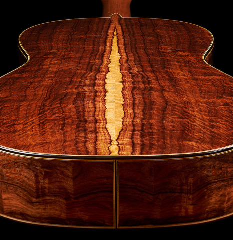 The back and sides at the foot of a 2024 Wolfgang Jellinghaus "Flamenca Negra" flamenco guitar with spruce and Granadillo.