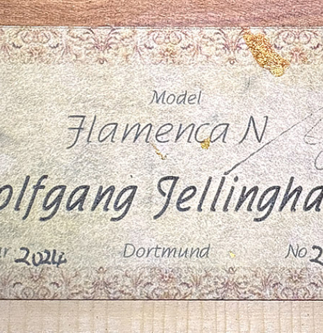 The label of a 2024 Wolfgang Jellinghaus "Flamenca Negra" flamenco guitar made of spruce and granadillo