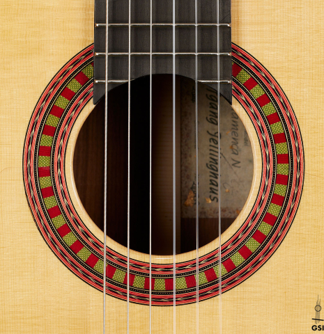 The rosette of a 2024 Wolfgang Jellinghaus "Flamenca Negra" flamenco guitar made of spruce and granadillo