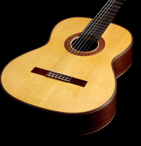 The soundboard of a 2024 Wolfgang Jellinghaus "Flamenca Negra" flamenco guitar with spruce and Indian rosewood