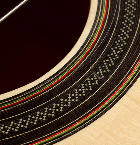 Detailed closeup of the rosette of a La Cañada "1934 Domino Esteso" flamenco guitar made of spruce and cypress