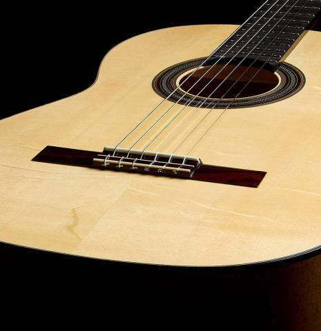 The soundboard of a La Cañada "1934 Domino Esteso" flamenco guitar made of spruce and cypress