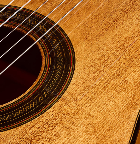 The soundboard and rosette of a La Cañada "1934 Domino Esteso - A" flamenco guitar made of spruce and cypress