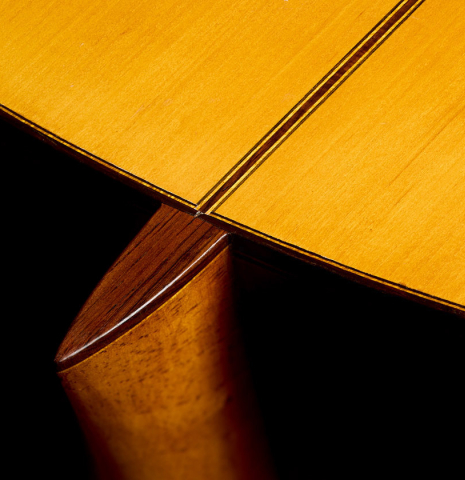 The heel, back binding and purfling of a 1961 Marcelino Lopez "Blanca" flamenco guitar made of spruce and cypress