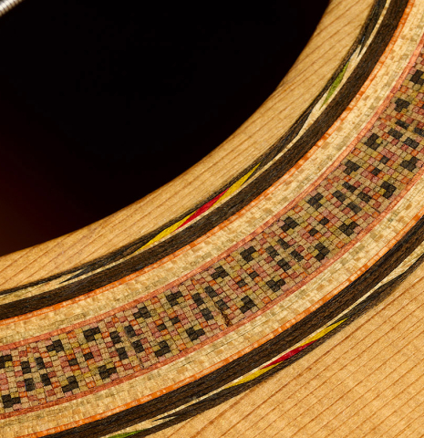 Detailed close-up of the rosette of a 1961 Marcelino Lopez "Blanca" flamenco guitar made of spruce and cypress