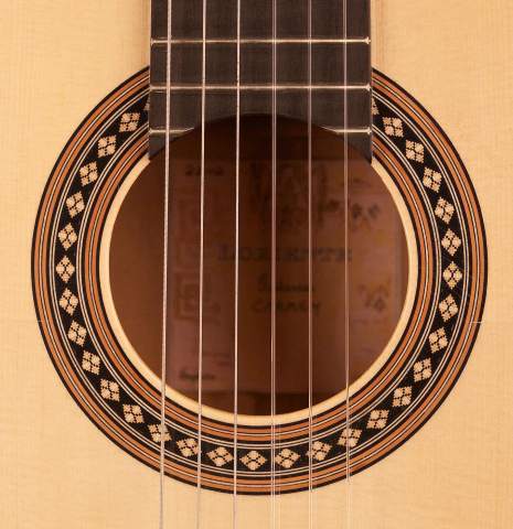 The rosette of a Loriente &quot;Carmen&quot; flamenco guitar made with spruce top and cypress back and sides