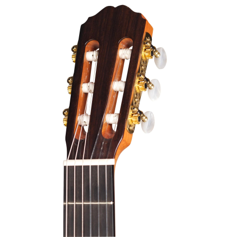 The headstock of a Loriente "Carmen" flamenco guitar made with spruce top and cypress back and sides
