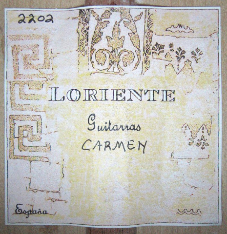 The label of a Loriente &quot;Carmen&quot; flamenco guitar made with spruce top and cypress back and sides