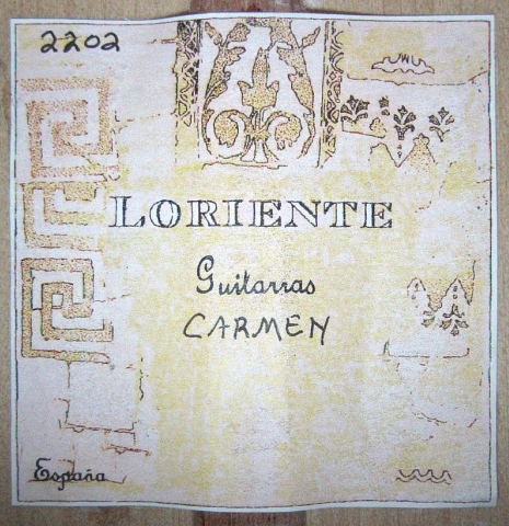 The label of a Loriente "Carmen" flamenco guitar made with spruce top and cypress back and sides