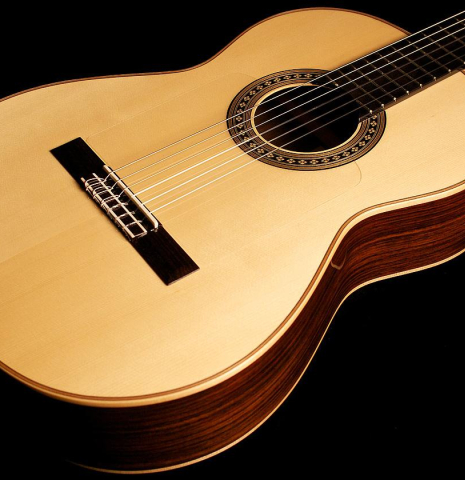 The soundboard of a Loriente &quot;Carmen Negra&quot; flamenco negra guitar made of spruce and Indian rosewood.