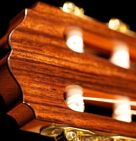 The headstock of a Loriente &quot;Carmen Negra&quot; flamenco negra guitar made of spruce and Indian rosewood.