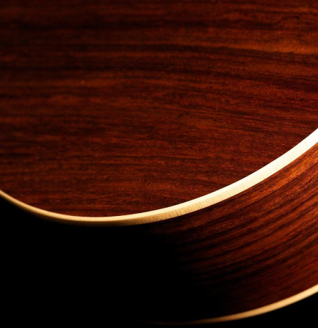 The back of a Loriente &quot;Carmen Negra&quot; flamenco negra guitar made of spruce and Indian rosewood.