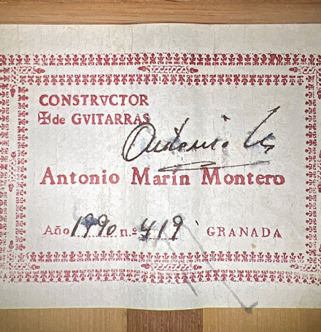 The label of a 1990 Antonio Marin Montero flamenco guitar made of spruce and cypress