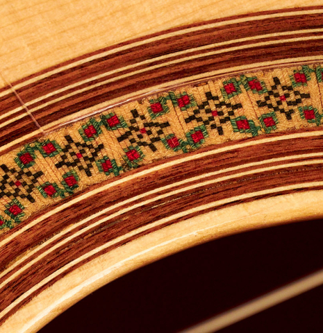 The rosette of a 1990 Antonio Marin Montero flamenco guitar made of spruce and cypress