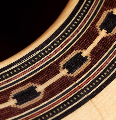The rosette of a 2006 Rafael Moreno Rodriguez &quot;Negra&quot; flamenco guitar made of spruce and CSA rosewood.