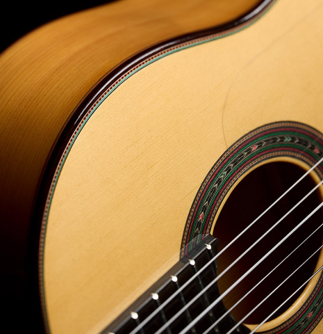The soundboard and rosette of a 2026 Teodoro Perez "Flamenco Blanca" guitar made of spruce and cypress