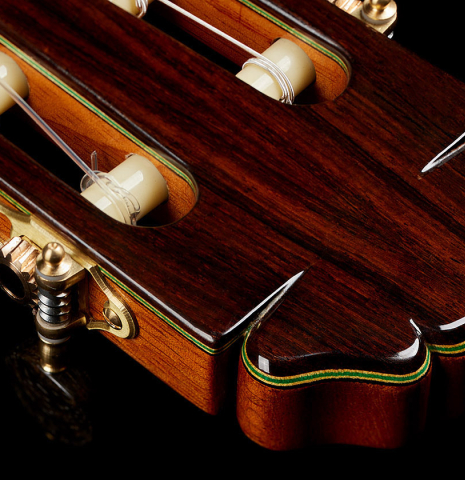 The headstock veneer and tuning machines of a 2025 Teodoro Perez "Flamenco Negra" guitar made of spruce and African rosewood