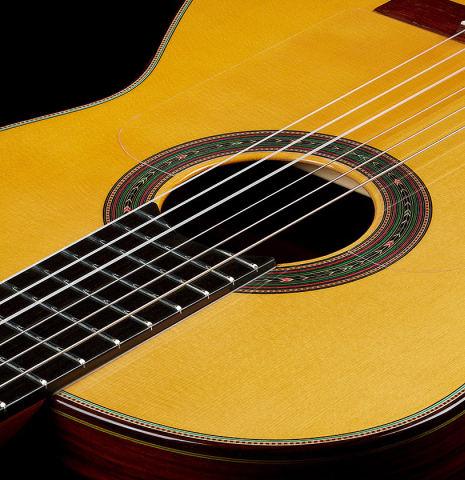 The soundboard of a 2025 Teodoro Perez "Flamenco Negra" guitar made of spruce and African rosewood