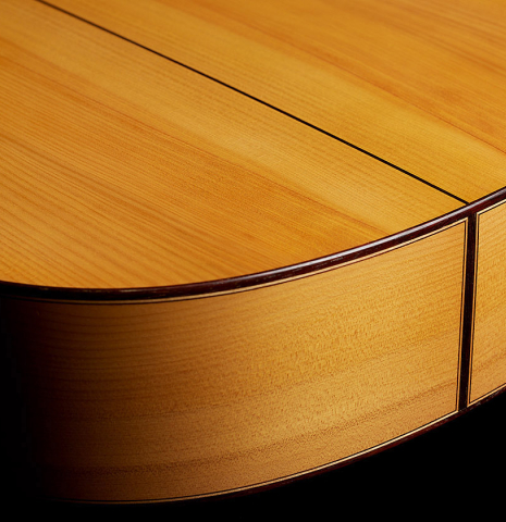 The sides at the foot of a 1999 Jose Marin Plazuelo flamenco guitar made of spruce and cypress