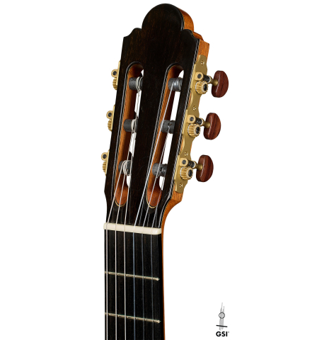 The headstock of a 2014 Jose Marin Plazuelo "Negra" flamenco guitar made of spruce and Indian rosewood