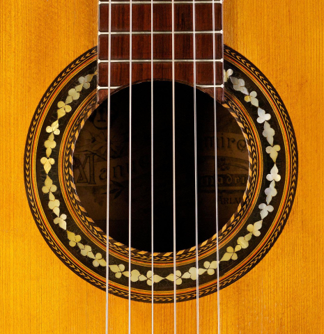 The rosette of a c. 1912 Manuel Ramirez flamenco guitar made with spruce and cypress