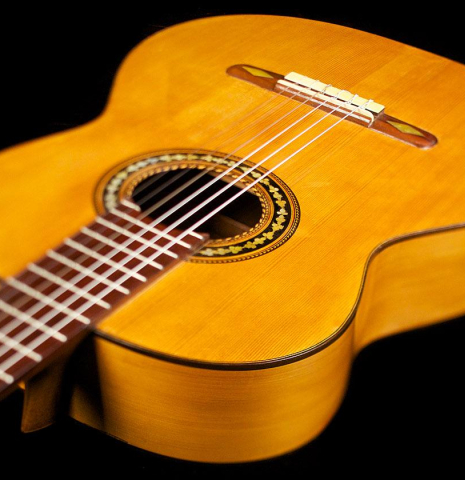The soundboard and side of a c. 1912 Manuel Ramirez flamenco guitar made with spruce and cypress