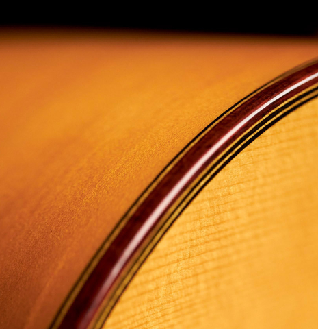 The binding of a 1963 Jose Ramirez &quot;2aF MM&quot; flamenco guitar made with spruce and cypress