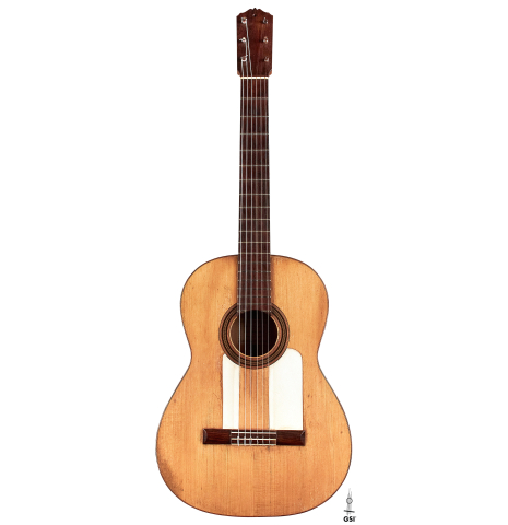 The front of a 1916 Viuda de Manuel Ramirez flamenco guitar made with spruce and cypress and pegs