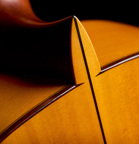 The heel, back binding and purfling of a 1964 Jose Ramirez "1aF MM" flamenco guitar made of spruce and cypress