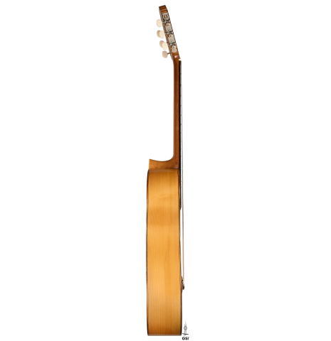 The side of a 1991 Antonio Raya Pardo flamenco guitar made of spruce and cypress