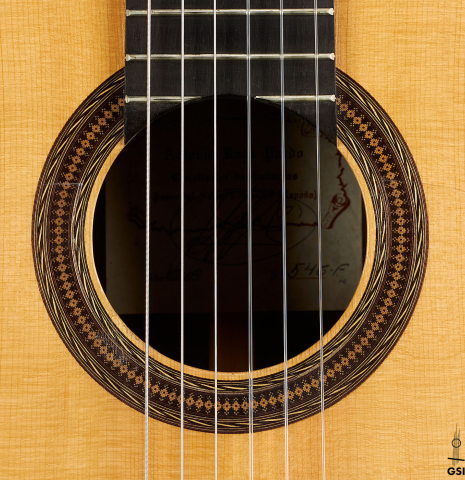 The rosette of a 2003 Antonio Raya Pardo "Negra" flamenco guitar made of spruce and CSA rosewood