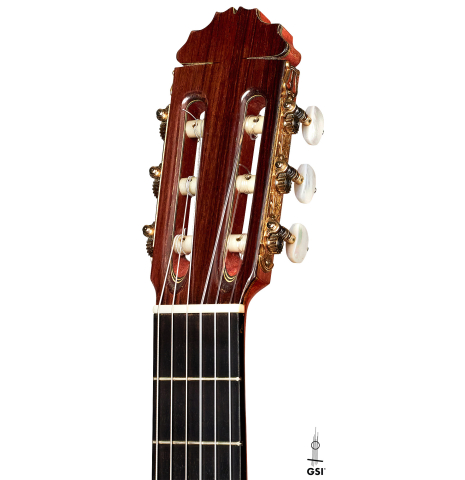 The headstock of a 2007 Manuel Reyes flamenco guitar made of spruce and cypress