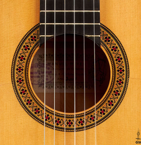 The rosette of a 2007 Manuel Reyes flamenco guitar made of spruce and cypress