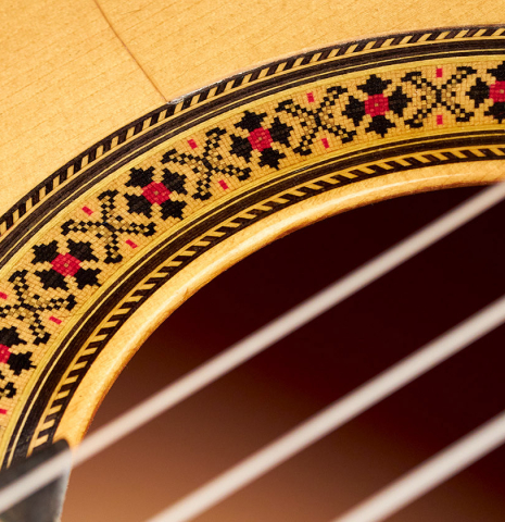 The rosette of a 2007 Manuel Reyes flamenco guitar made of spruce and cypress
