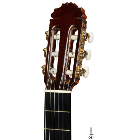 The headstock of a 1997 Manuel Reyes flamenco guitar made of spruce and cypress