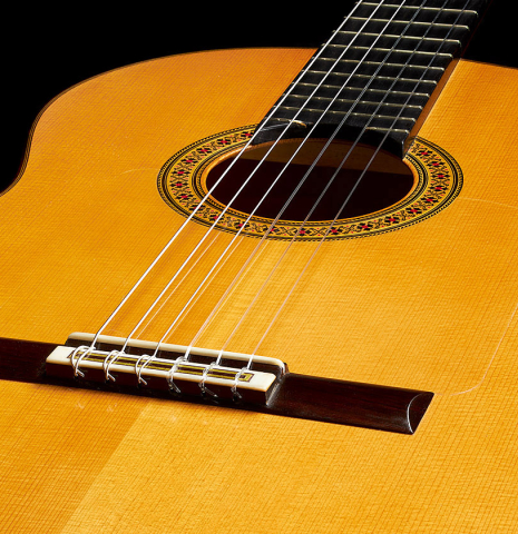 The soundboard of a 1997 Manuel Reyes flamenco guitar made of spruce and cypress
